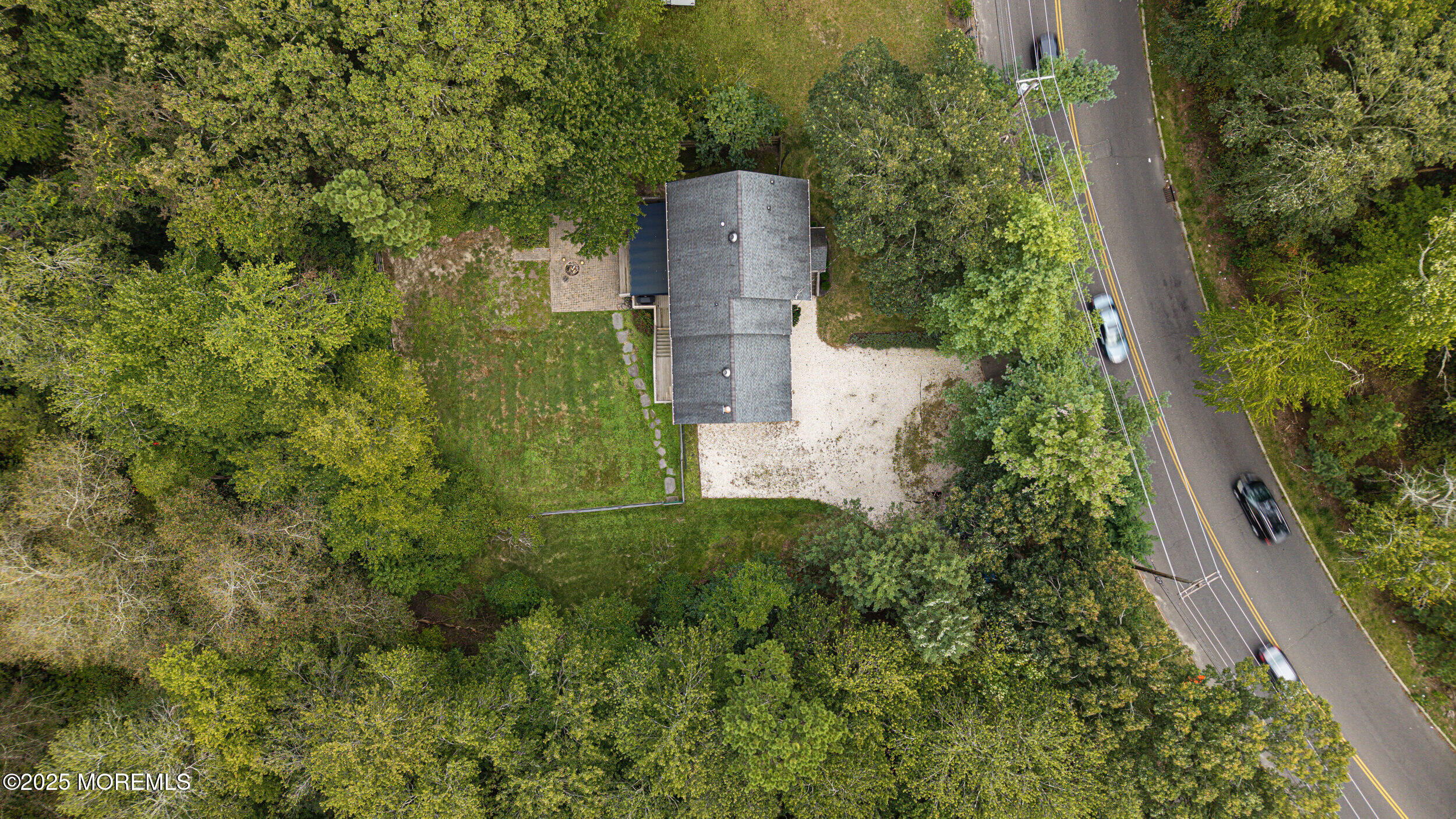 1961 Jumping Brook Road Tinton Falls, NJ 07753 - Photo 7 of 45 an aerial view of a house with a yard and large tree