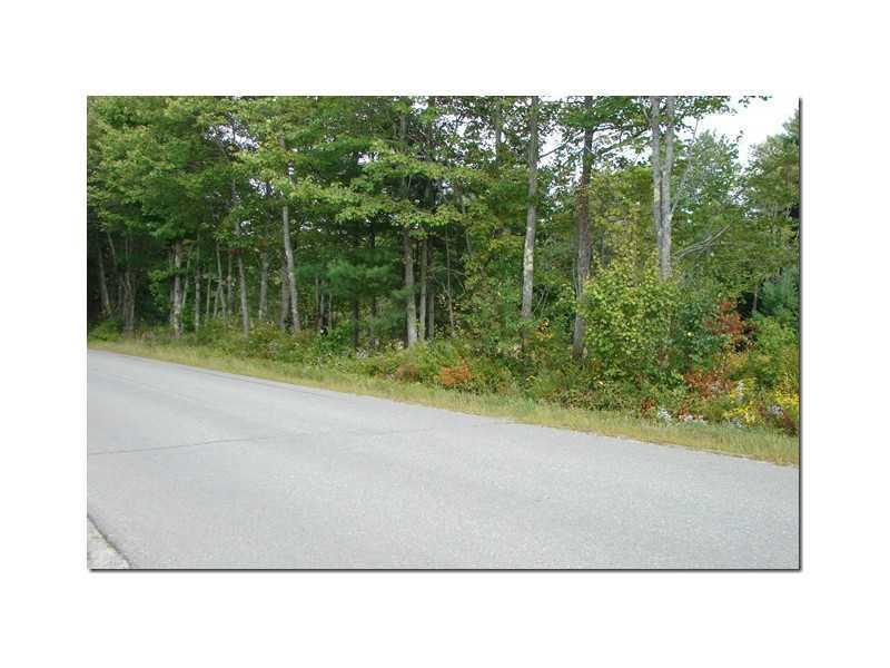 441 Wiswell Road Holden, ME 04429 - Photo 7 of 27 Other. Road and the woods across the...