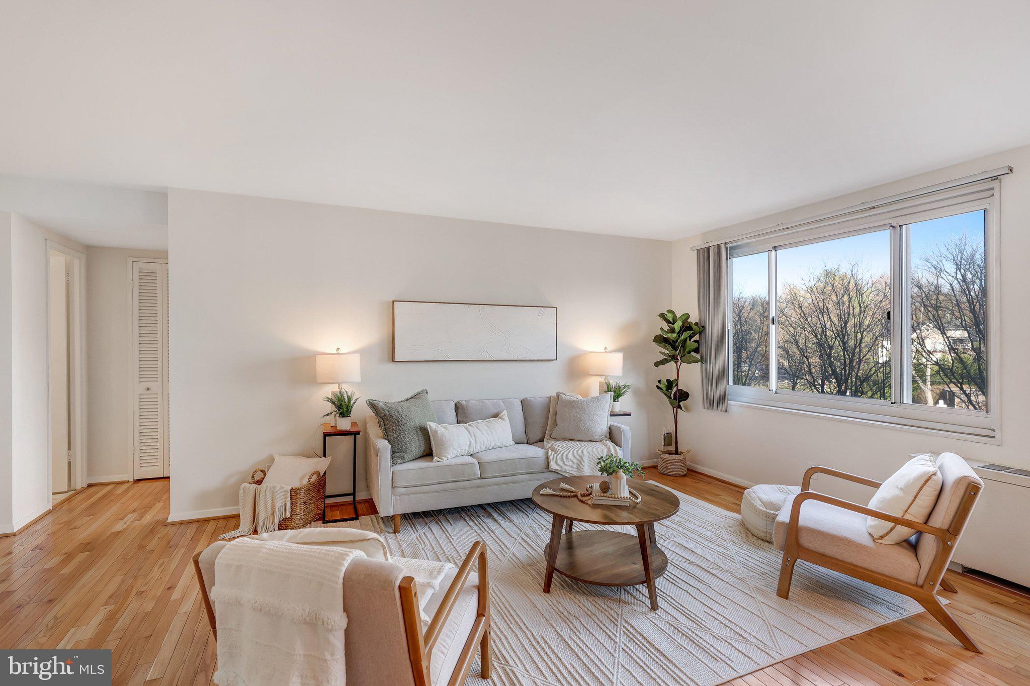 1900 Lyttonsville Road, Unit 504 Silver Spring, MD 20910 - Photo 4 of 16 Spacious Living Room