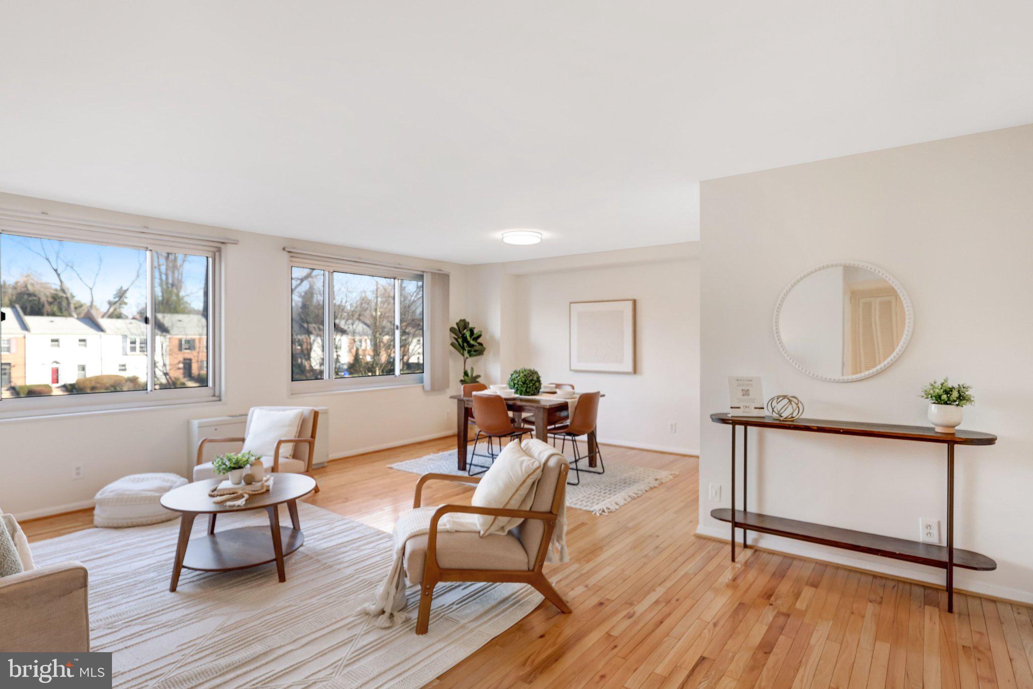 1900 Lyttonsville Road, Unit 504 Silver Spring, MD 20910 - Photo 5 of 16 Light-Filled Living Room