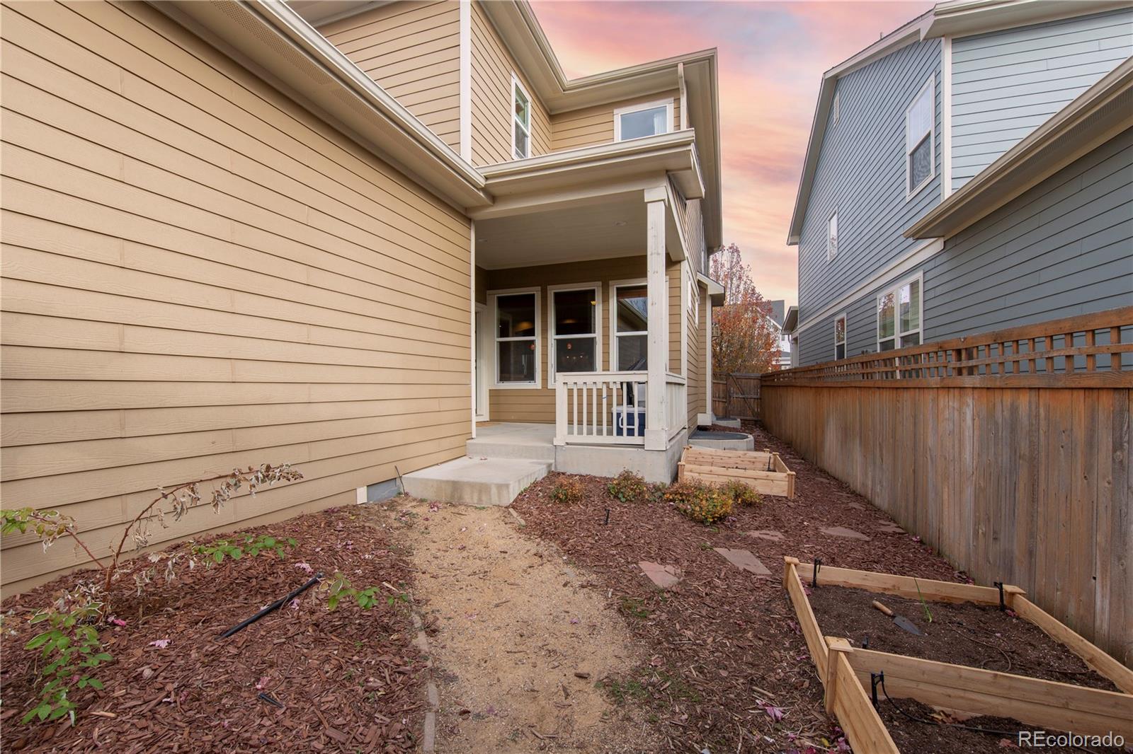 2907 Ironton Street Denver, CO 80238 - Photo 29 of 29 a view of a house with a yard