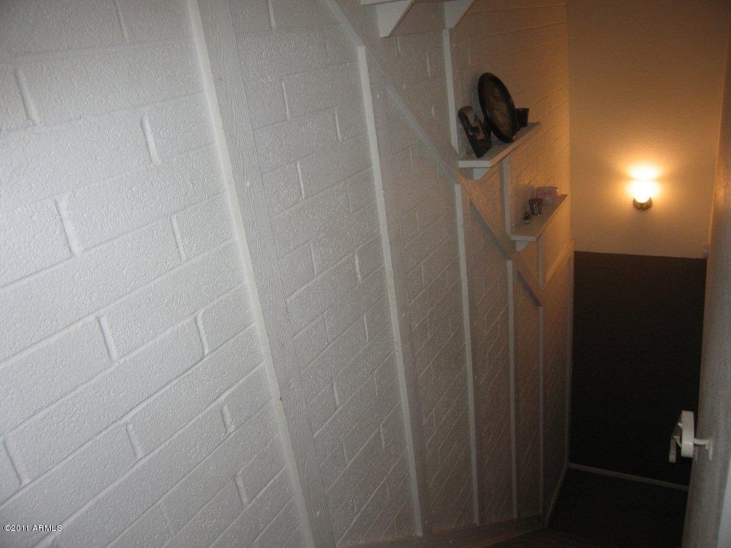 600 South Dobson Road, Unit 80 Mesa, AZ 85202 - Photo 6 of 12 stairwell with painted wrought iron rail