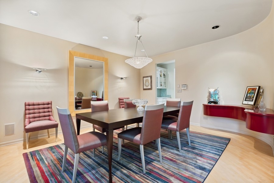 69 Riverside Drive Deerfield, IL 60015 - Photo 4 of 27 a view of a dining room with furniture