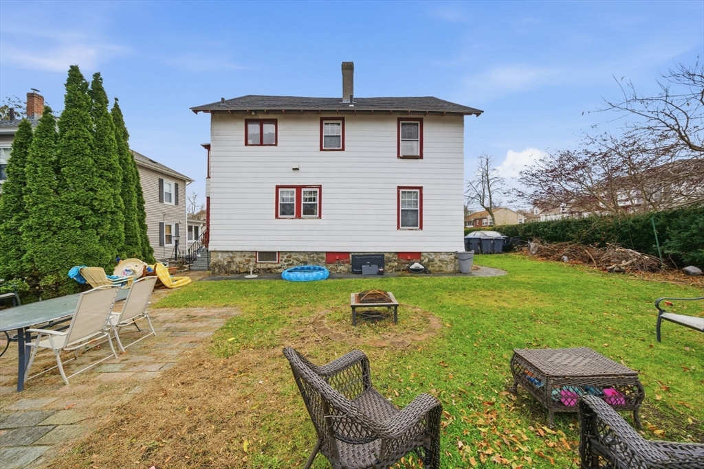 37 Albion Street Methuen, MA 01844 - Photo 19 of 26 a backyard of a house with table and chairs