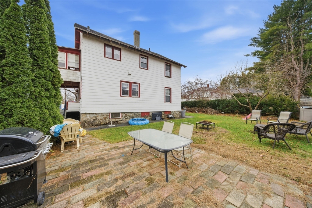 37 Albion Street Methuen, MA 01844 - Photo 20 of 26 a front view of house with a garden and patio