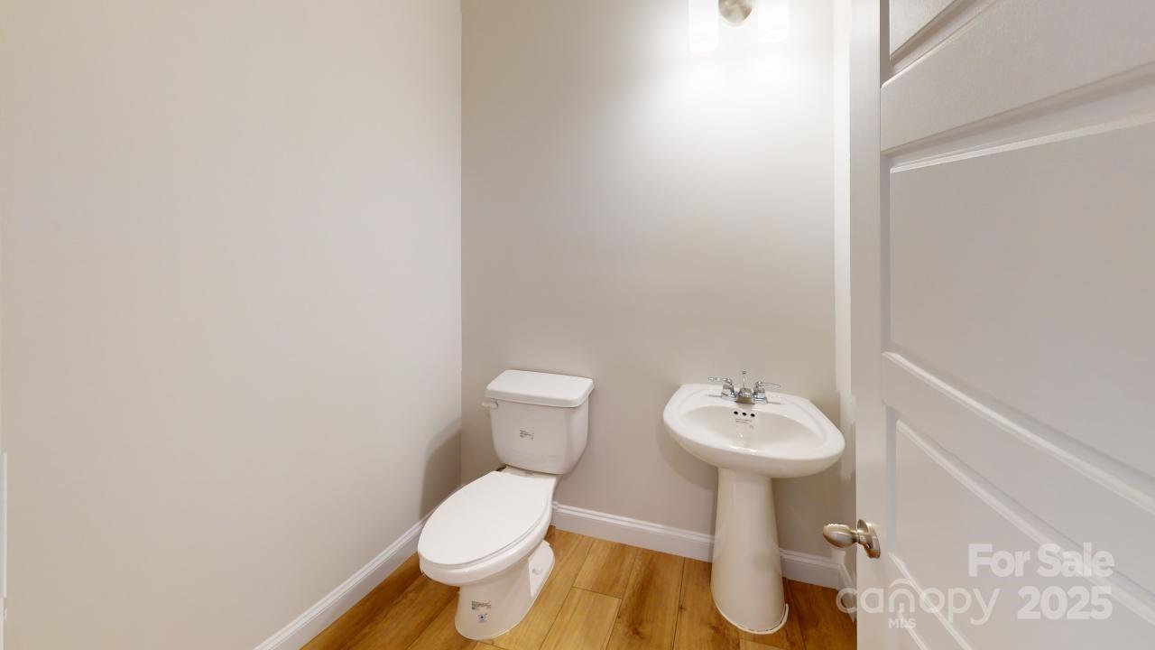 515 Tates Trail, Unit 39 Cramerton, NC 28056 - Photo 11 of 33 a bathroom with a sink and a toilet