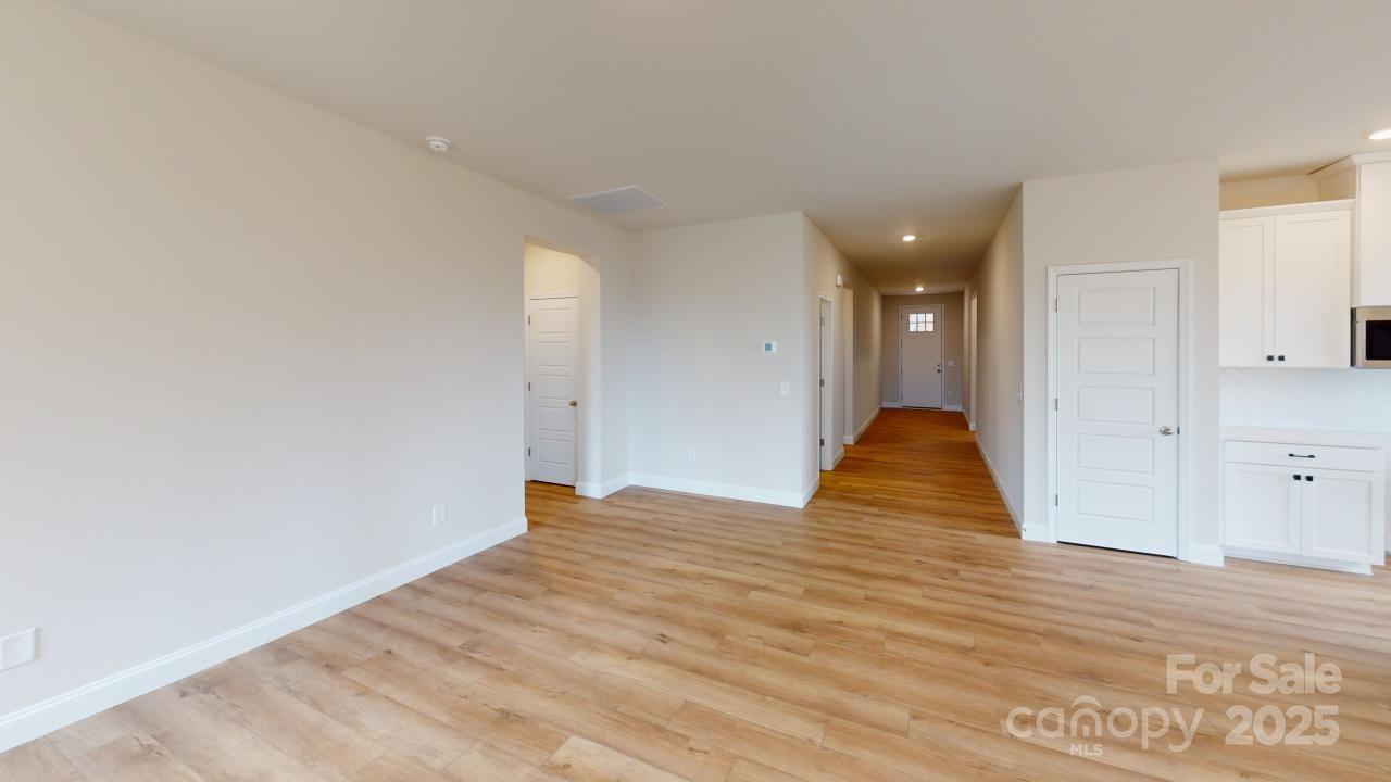 515 Tates Trail, Unit 39 Cramerton, NC 28056 - Photo 19 of 33 a view of empty room with wooden floor