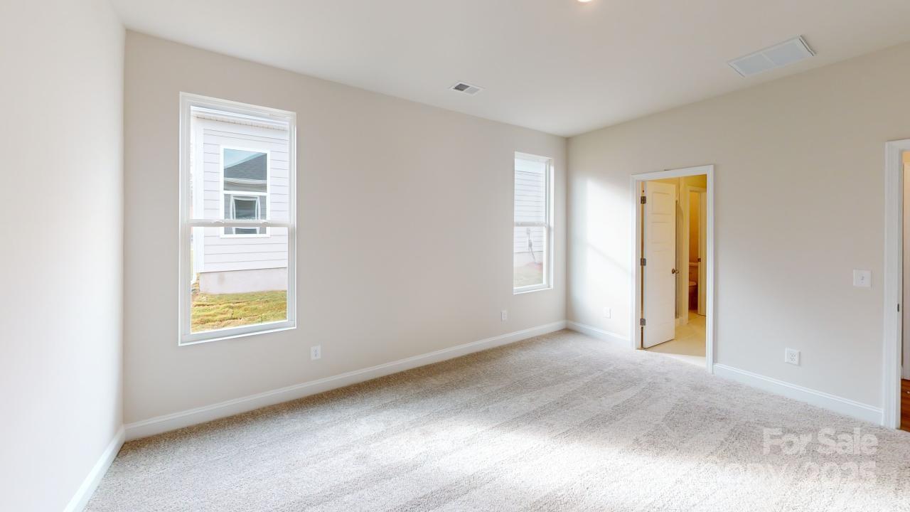 515 Tates Trail, Unit 39 Cramerton, NC 28056 - Photo 5 of 33 a view of an empty room and a window
