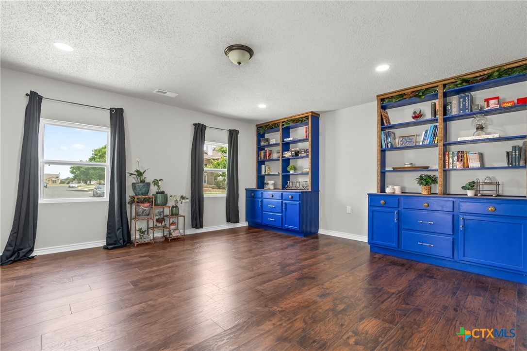 2804 Bluejay Drive Killeen, TX 76549 - Photo 14 of 36 a view of workspace with furniture and wooden floor