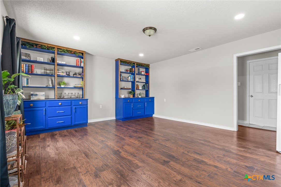 2804 Bluejay Drive Killeen, TX 76549 - Photo 15 of 36 a view of workspace with furniture and wooden floor