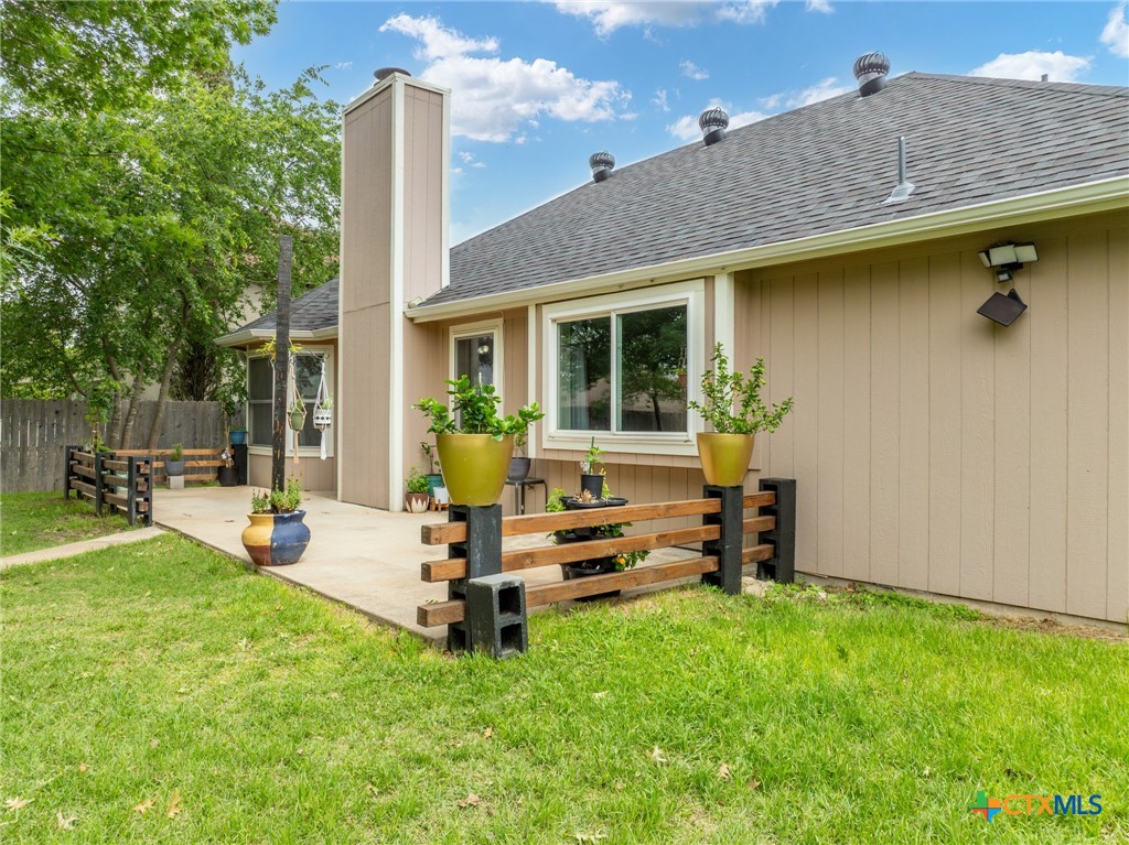 2804 Bluejay Drive Killeen, TX 76549 - Photo 26 of 36 a view of a house with backyard sitting area and garden