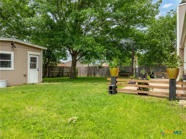 a garden view with a seating space