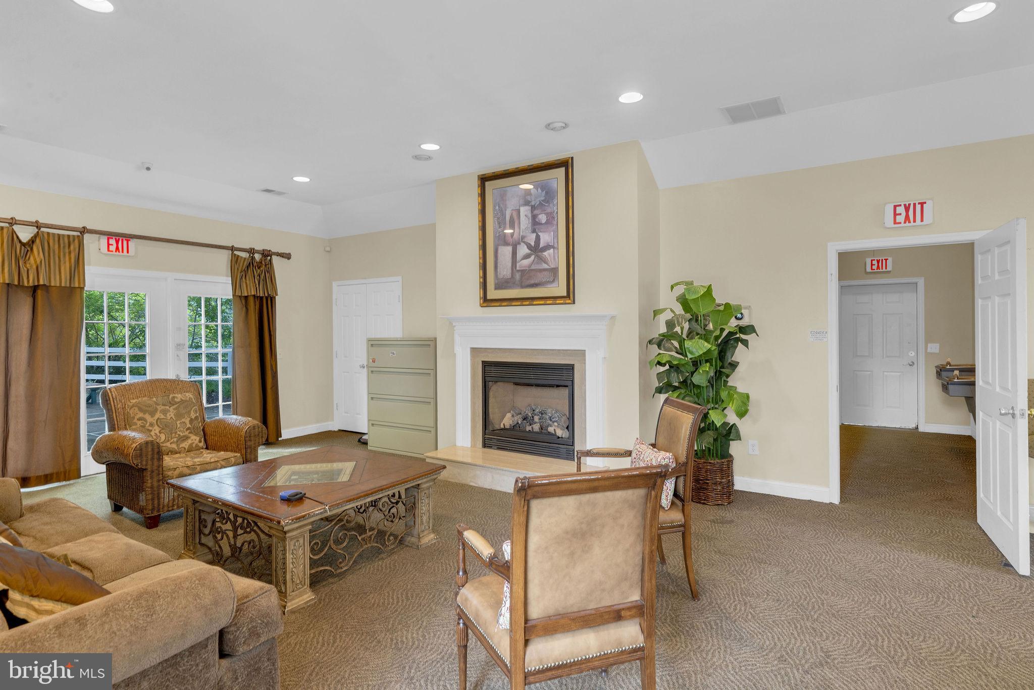 16 Cardiff Court Princeton Junction, NJ 08550 - Photo 51 of 60 a living room with furniture potted plant and a fireplace