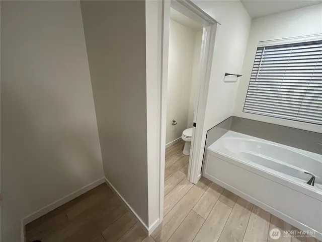 a view of a backyard of the house