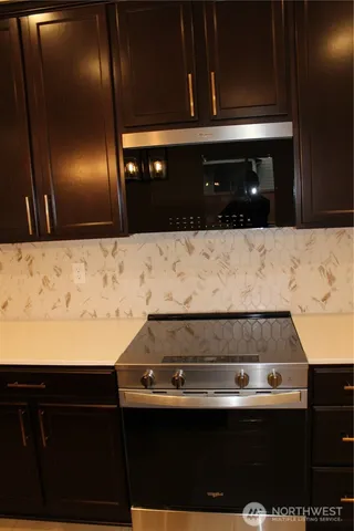 a view of a kitchen with a sink