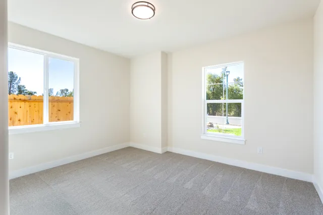 an empty room with windows
