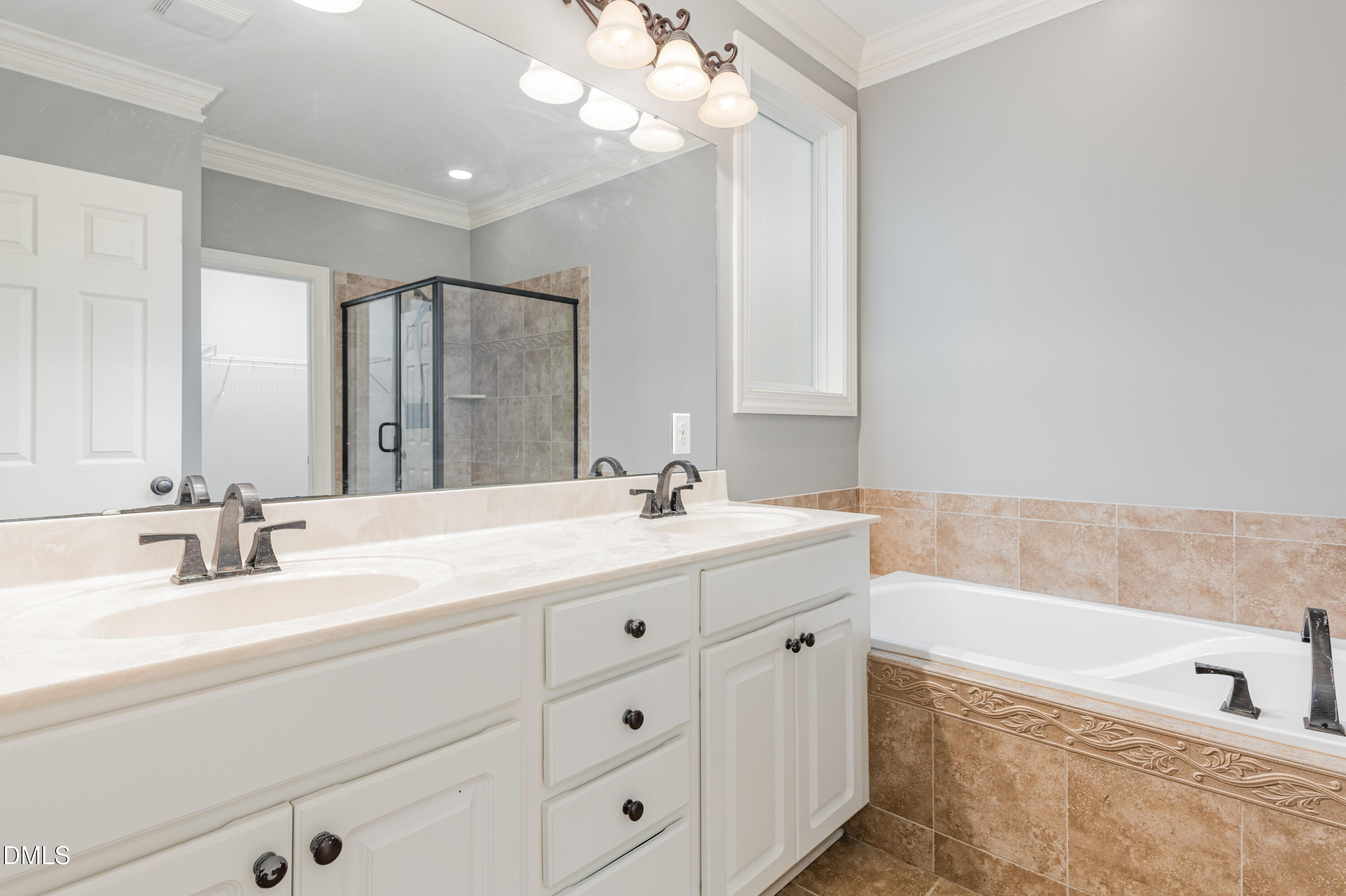 204 Blair Hills Road Wendell, NC 27591 - Photo 14 of 24 a bathroom with a granite countertop sink mirror and bathtub