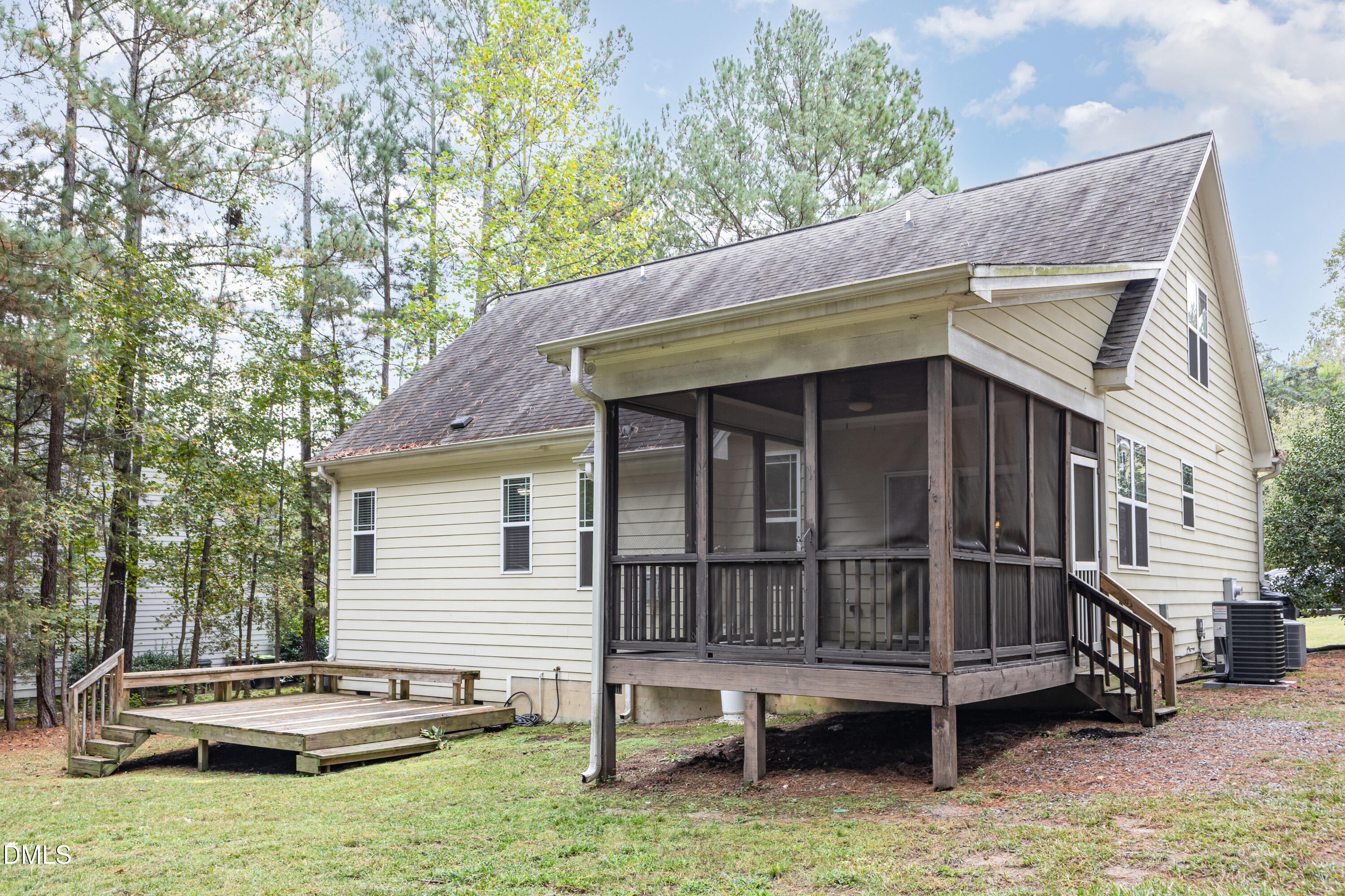 204 Blair Hills Road Wendell, NC 27591 - Photo 22 of 24 a view of a house with a yard and sitting area