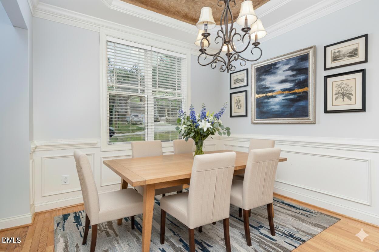 204 Blair Hills Road Wendell, NC 27591 - Photo 3 of 24 a view of a dining room with furniture window and wooden floor