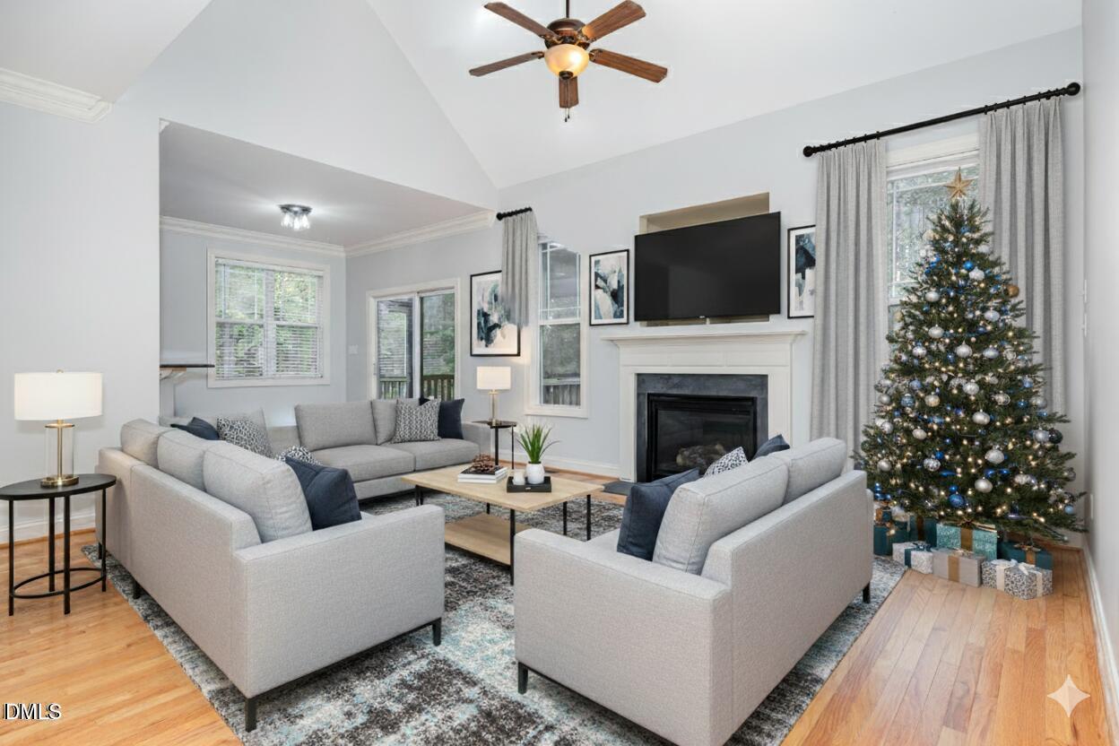 204 Blair Hills Road Wendell, NC 27591 - Photo 6 of 24 a living room with furniture fireplace and a flat screen tv
