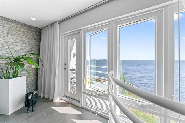 a front view of a house with outdoor seating