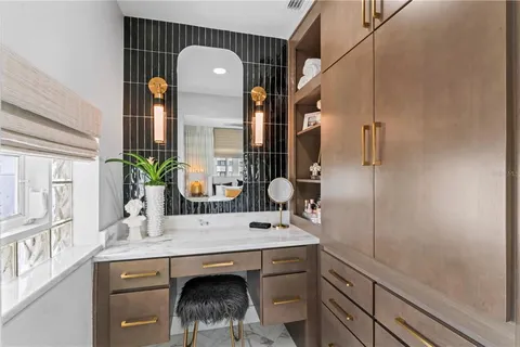 a picture of a bench in front of a wall