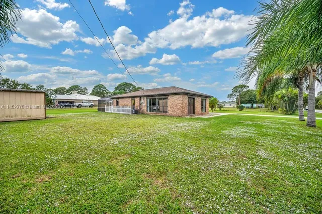 a house view with a garden space