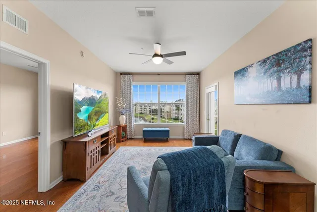 a front view of a building with a yard