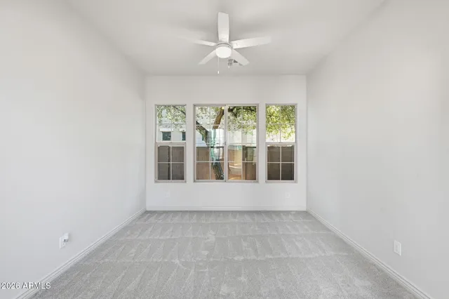 a kitchen with stainless steel appliances granite countertop a refrigerator a sink dishwasher and wooden cabinets with a stove