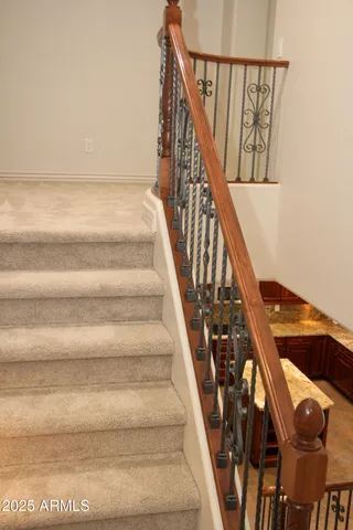 an empty room with closet and a bathroom