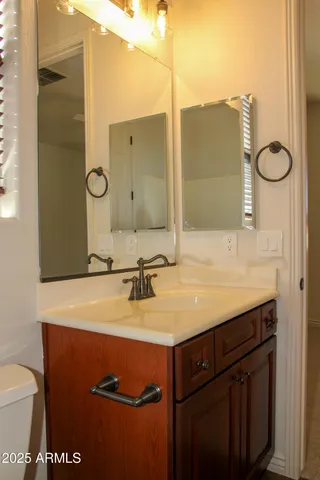 a view of a livingroom with a staircase