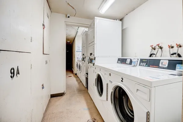 a utility room with dryer and washer