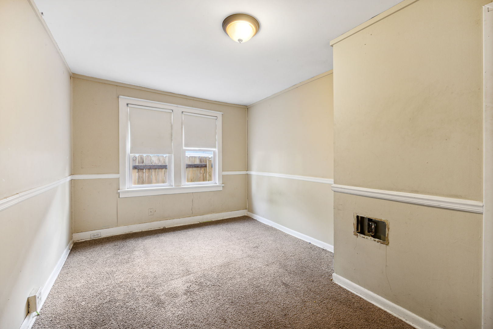 208 South Park Road Joliet, IL 60433 - Photo 19 of 29 a view of an empty room with a window
