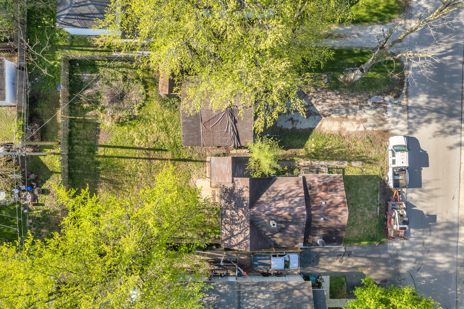 208 South Park Road Joliet, IL 60433 - Photo 28 of 29 a view of a big yard with large tree