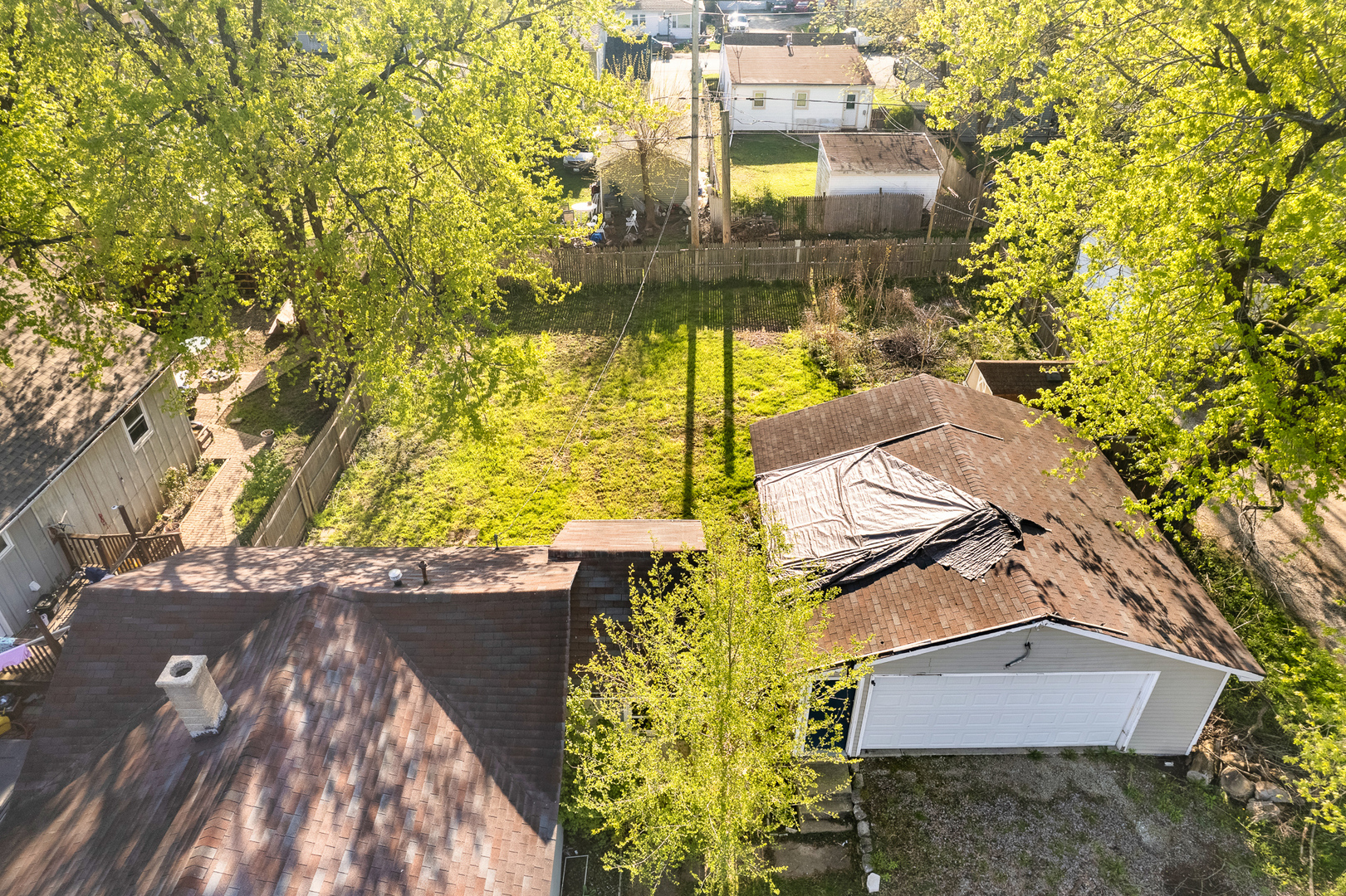 208 South Park Road Joliet, IL 60433 - Photo 4 of 29 a view of a yard with an outdoor space