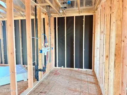 a view of a porch with wooden floor