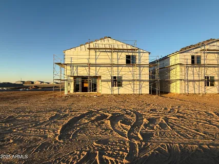 a view of a house with a ocean view