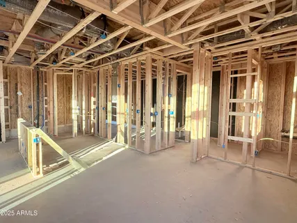 a view of an empty room with floor to ceiling window