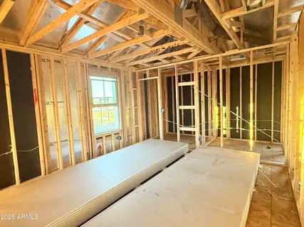 a view of a living room with a large window