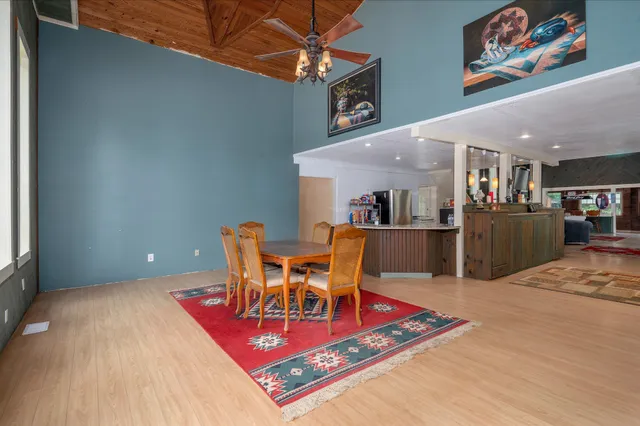 a view of a dining room with furniture