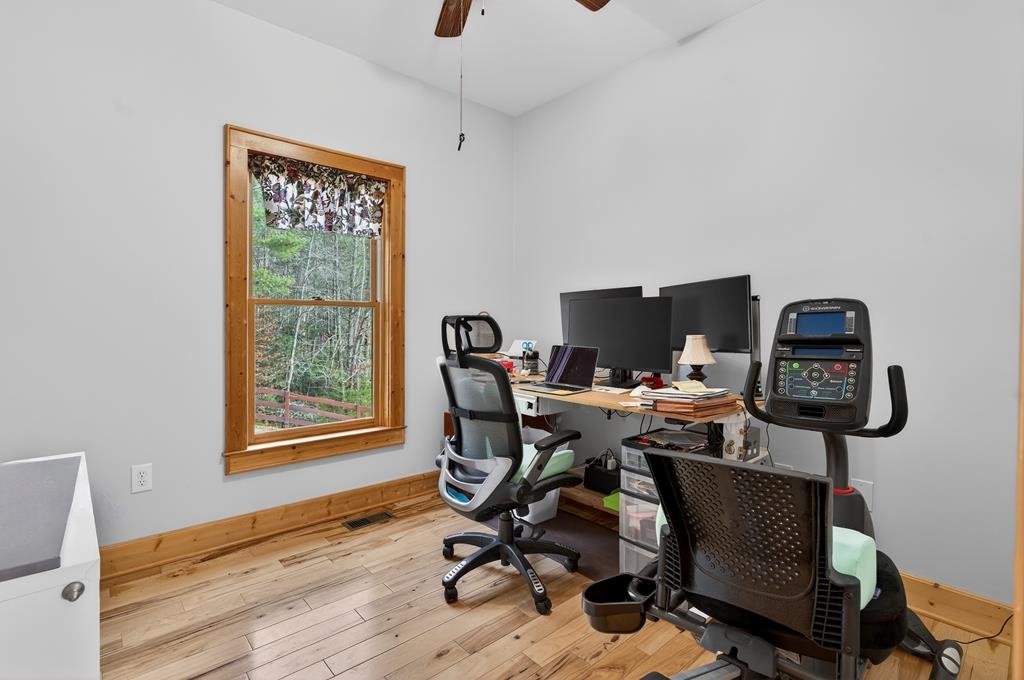 496 John Crow Road Dahlonega, GA 30533 - Photo 23 of 74 a view of a workspace with furniture and a window
