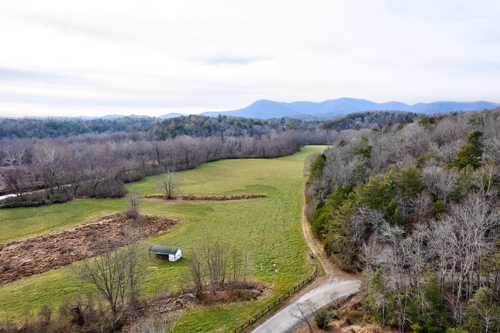 496 John Crow Road Dahlonega, GA 30533 - Photo 3 of 74 an aerial view of a house with mountain view