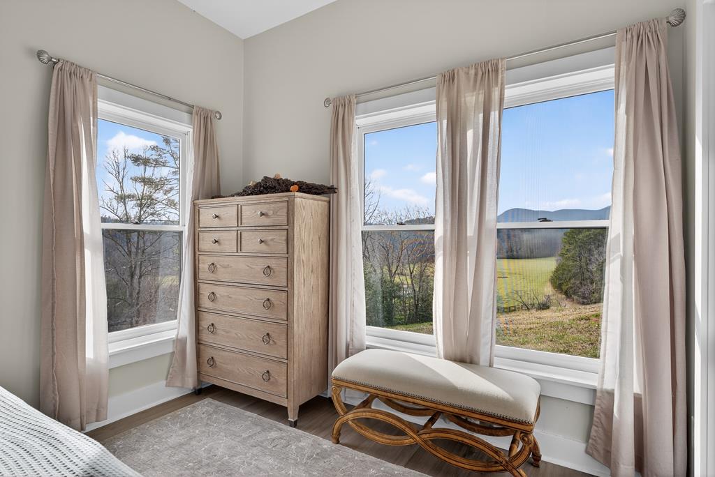 496 John Crow Road Dahlonega, GA 30533 - Photo 36 of 74 a bedroom with a bed and a window