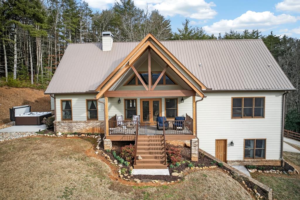 496 John Crow Road Dahlonega, GA 30533 - Photo 46 of 74 a front view of a house with garden