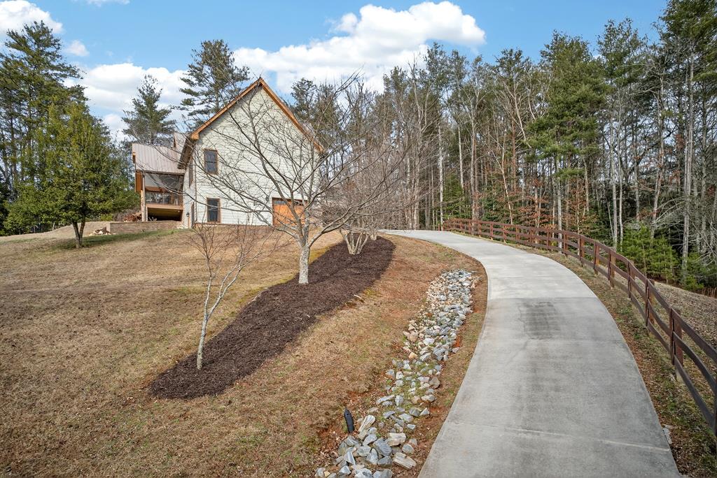 496 John Crow Road Dahlonega, GA 30533 - Photo 70 of 74 a view of a backyard with large trees