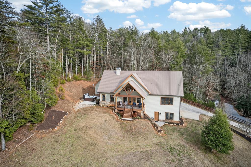 496 John Crow Road Dahlonega, GA 30533 - Photo 72 of 74 a aerial view of a house with a yard and sitting area