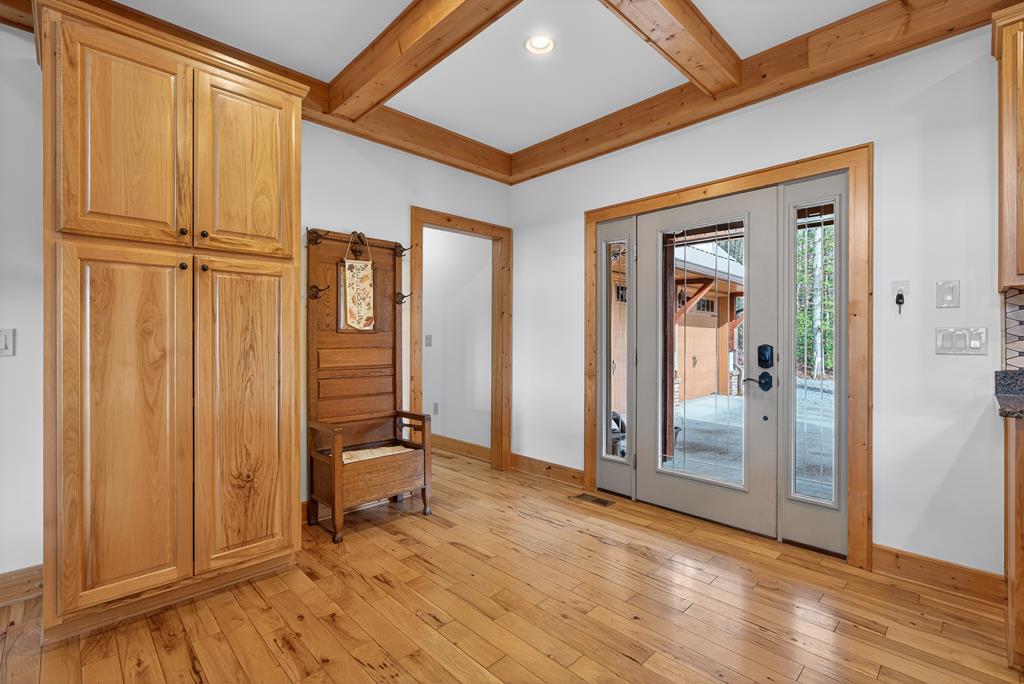 496 John Crow Road Dahlonega, GA 30533 - Photo 9 of 74 a view of a hallway with wooden floor and closet