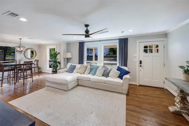 a living room with furniture and a table