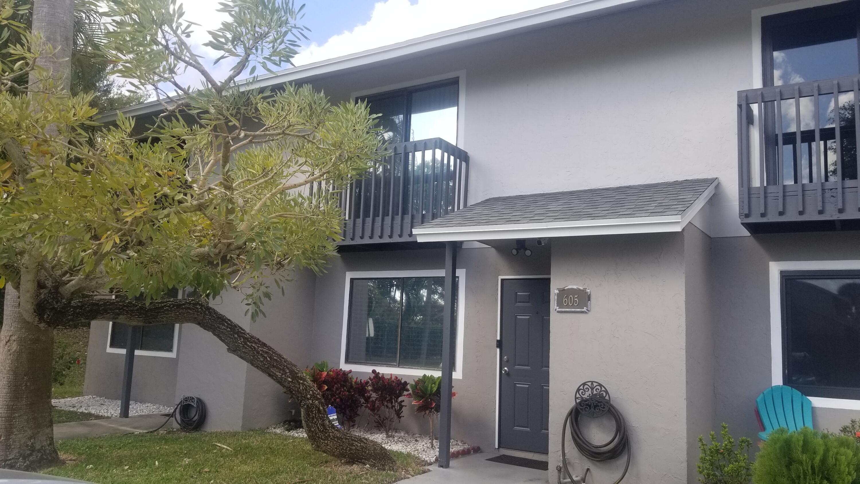 605 Riverside Drive Greenacres, FL 33463 - Photo 1 of 11 Front