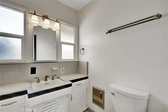 a bathroom with a tub and shower